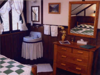 Green calico guest room Baldpate main lodge